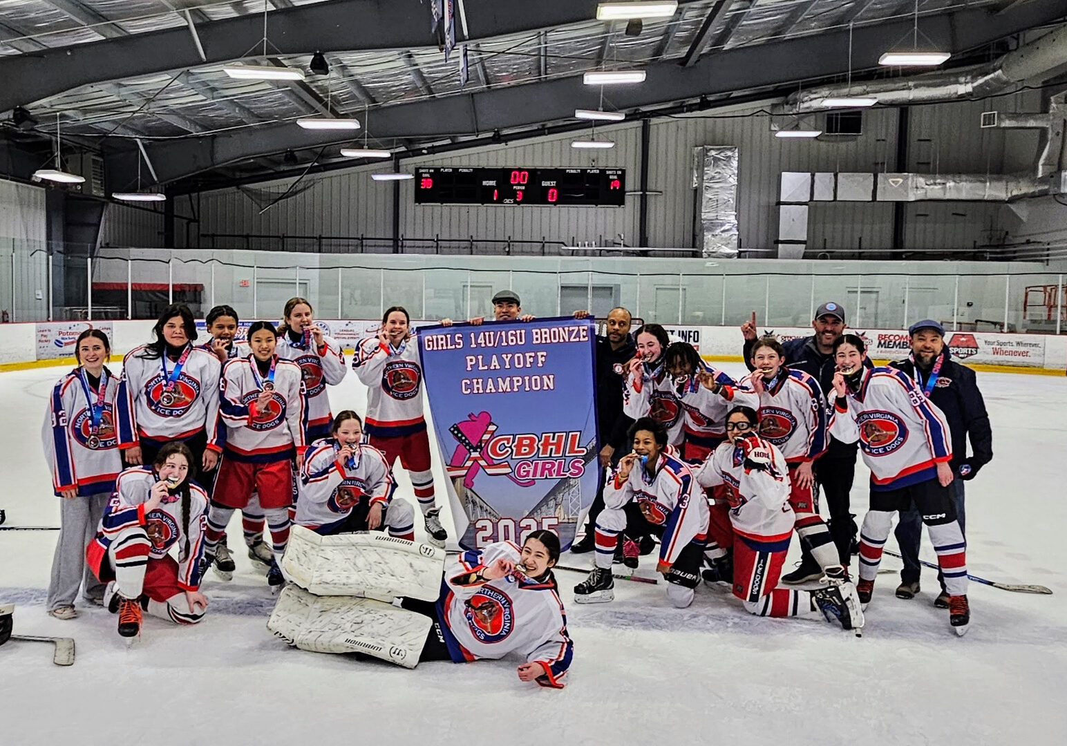 Girls team with a banner to celebrate the CBHL 14U/16U Bronze championship