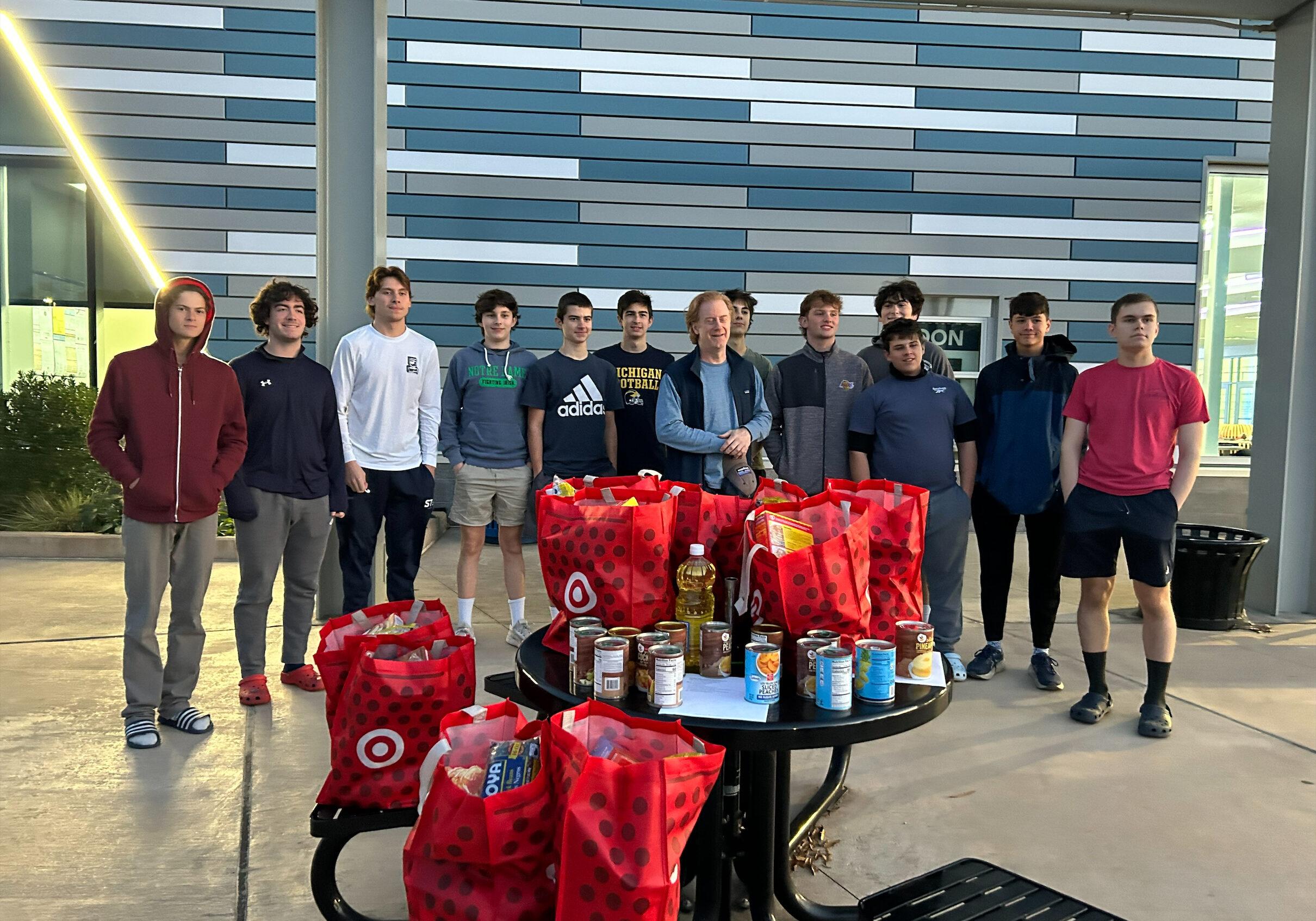 18U team packs bags for Be the Good